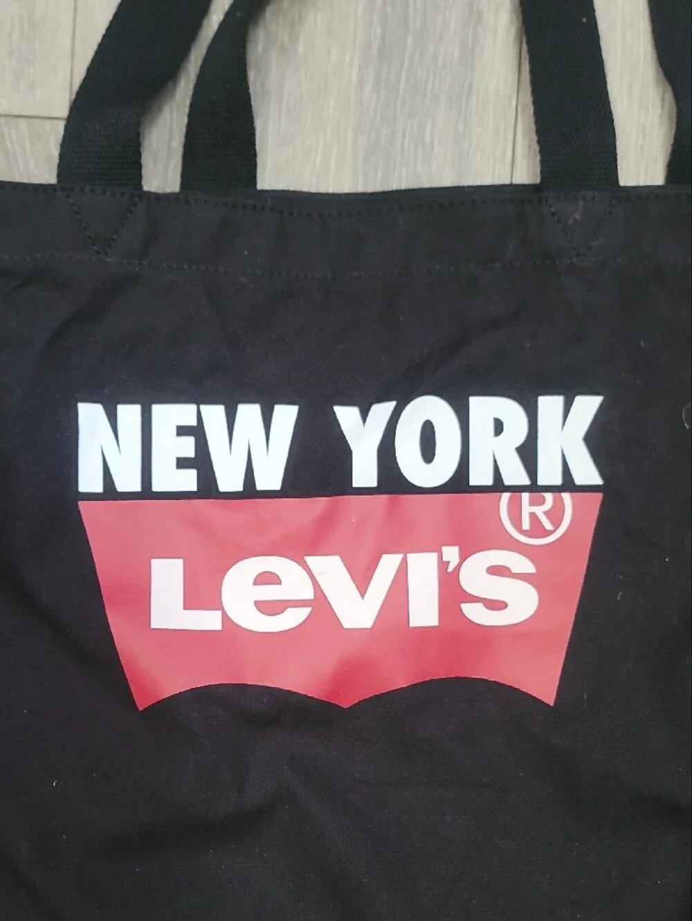 Levi's Black Canvas Tote with Red Logo and White Text